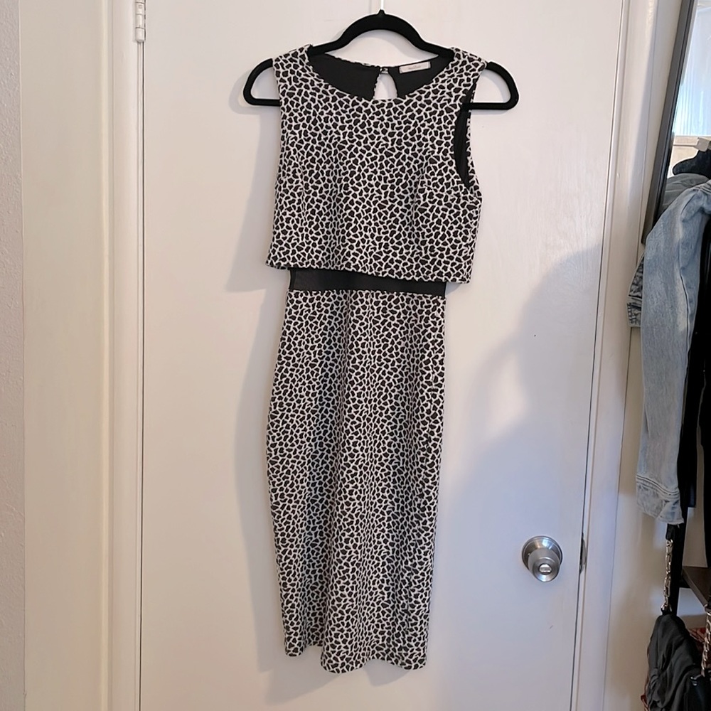 Bombshell black and white below the knee dress